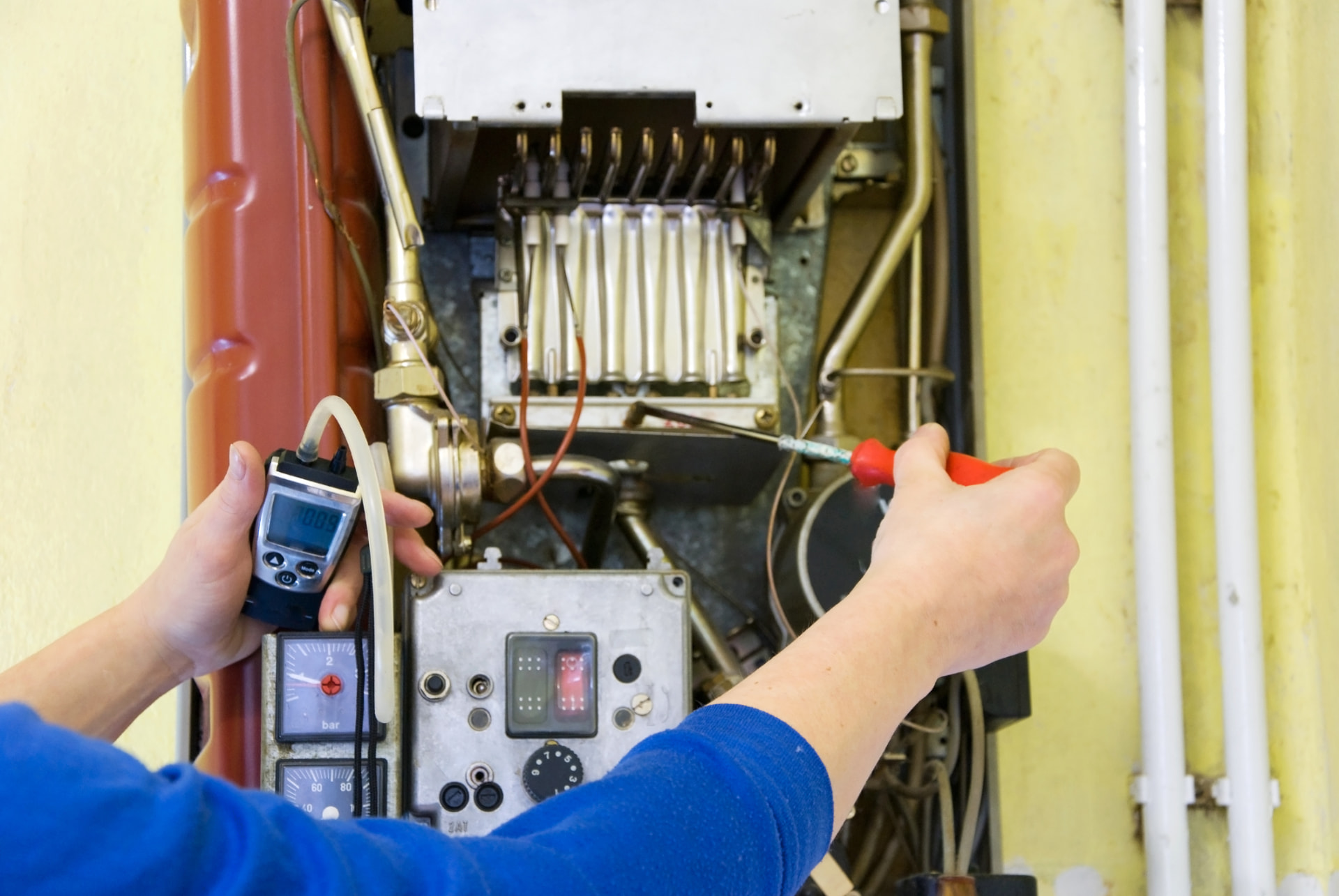 Technician performing hands-on maintenance on diesel-fired standby equipment